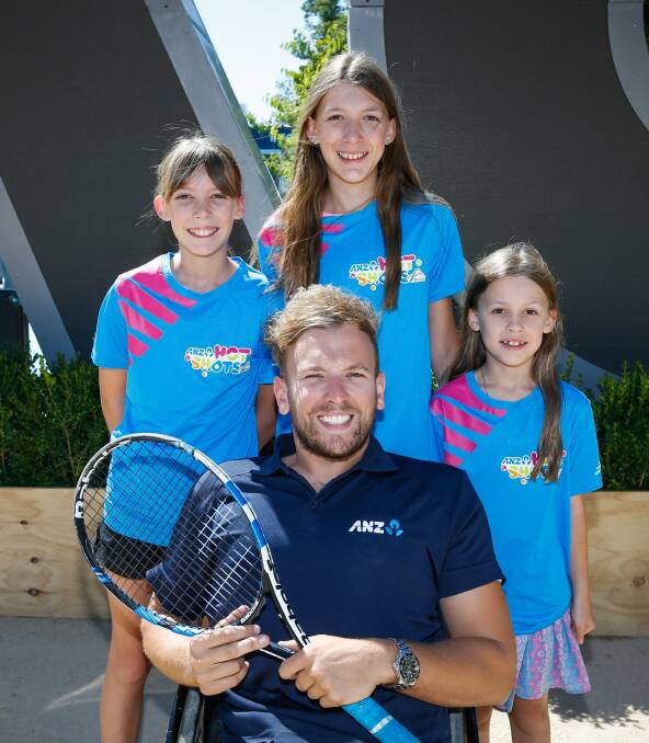 HOT SHOTS: Wodonga Tennis Centre sisters Abbey, Zoe and Caitlin Freeman with Paralympic champion Dylan Alcott at the Australian Open.