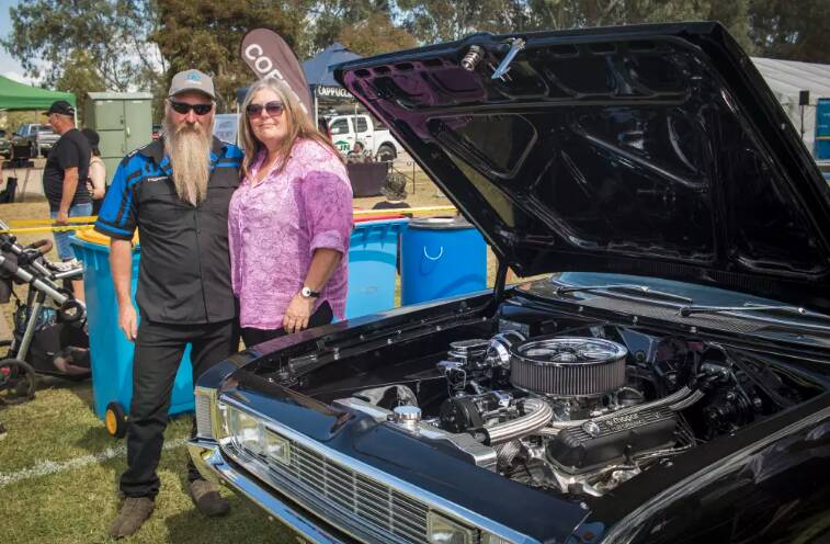 Faye and Glenn Watts from Yambuk, Victoria, with their 1971 VH Valiant wagon. Picture by Layton Holley