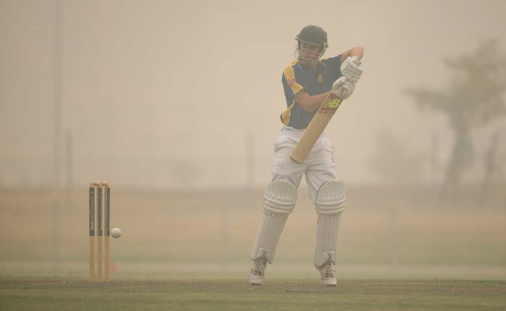 THICK SMOKE: Wangaratta's Luke Grady in action in Albury on Friday as smoke blanketed the region. Pictures: JAMES WILTSHIRE