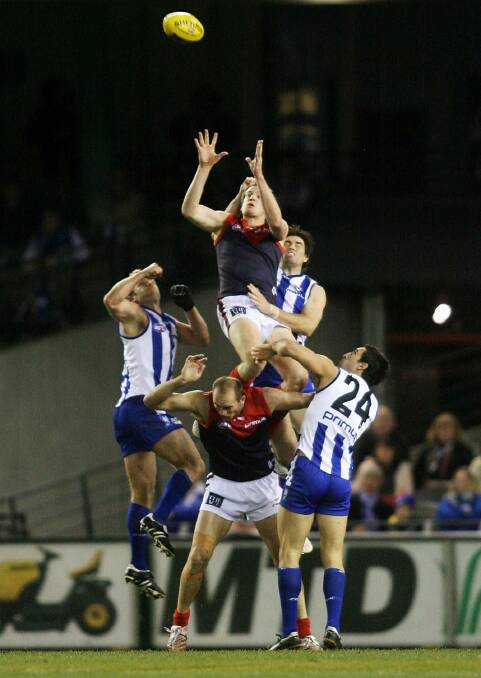 FLYING HIGH: Michael Newton leaps on David Neitz's back to the Mark of the Year in 2007.