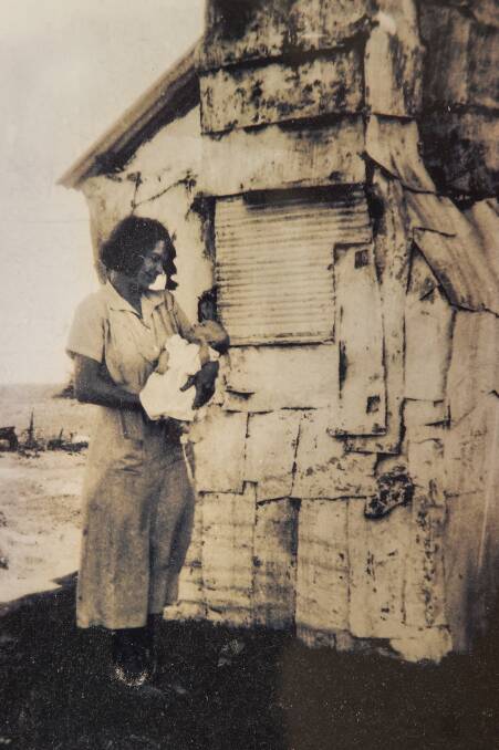 HUMBLE HOME: Nancy Rooke as a baby in the arms of her mother, Annie Scott, who lived to the age of 75.