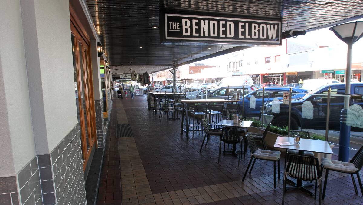 Timothy John Whitehead was drinking beer illegally by standing beside tables outside Albury's The Bended Elbow bar when he embarked on his abusive, violent behaviour.