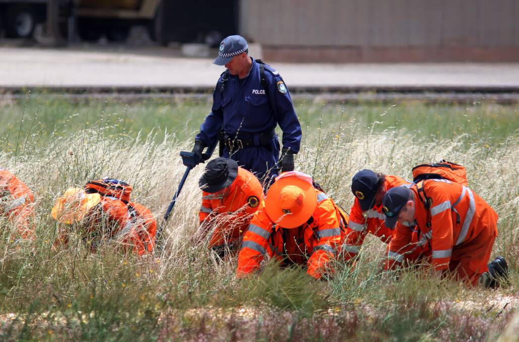 INVESTIGATION: Police and emergency services search near the Oaklands grain silos two weeks after Helen Preedy was shot by Corey Dean Beagley.