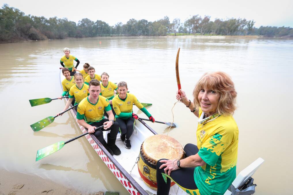 IN TRAINING: Drummer Maxine Reid, pictured at Gateway Lakes with many of those selected to represent Australia in dragon boat world championships in Thailand later this month. Pictures: JAMES WILTSHIRE