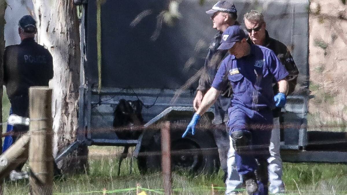 Police during a search for William Chaplin's remains.