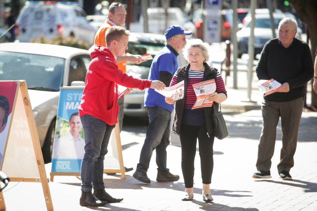Labor candidate Eric Kerr at Wangaratta's pre-poll centre during the federal election. A political expert says demanding compelling reasons for voting early could create a backlash. Picture: JAMES WILTSHIRE