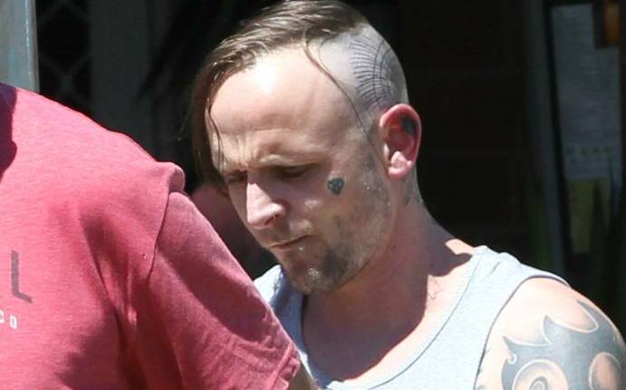 Benjamin Paul Heather, who now sports a shaved head, during an arrest in early 2017.