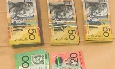 Some of the $54,820 in cash seized during a search of the Thurgoona home of Connor Tristian Thorn-Barnstable.