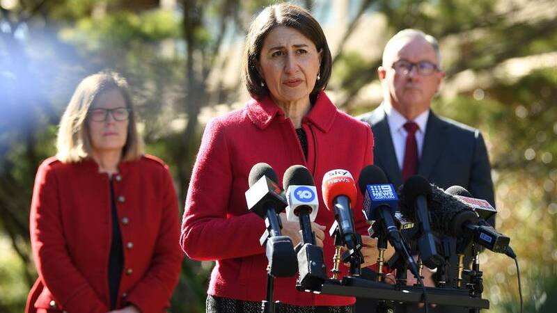 Premier defends redirecting doses from regions to Sydney students