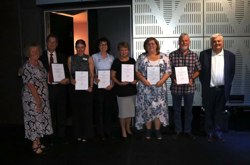 HONOURED: Albury Wodonga Health board commendation recipients with chair Nicki Melville are Dr Franz Eversheim, Nicolle Davies, Jane Ford, Jan Dihood, Emma Horsfield and Ian Wicks, along with chief executive Michael Kalimnios. Picture: FACEBOOK