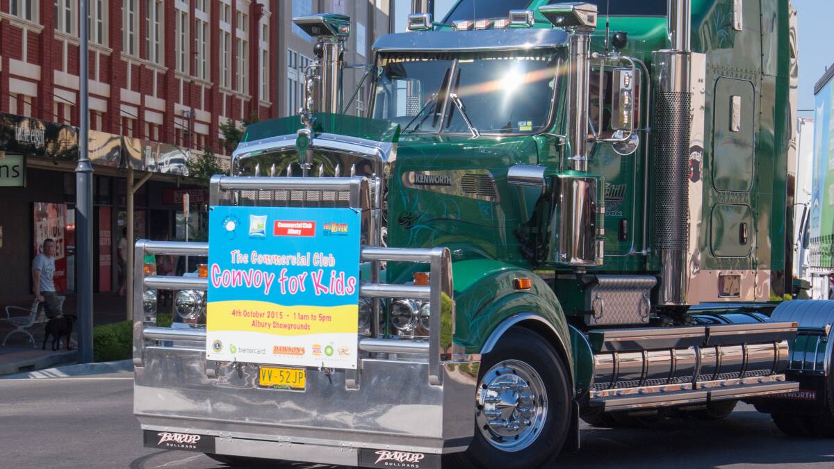 TAKING THE TURN: The Convoy for Kids wends its way through Albury streets on Sunday. Up to 150 trucks took part in the trek from Barnawartha to the Albury Showgrounds. Picture: JODIE TARDREW