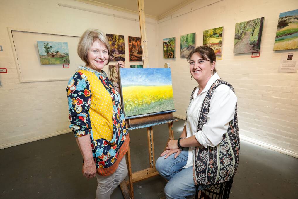 ART EXHIBITION: Artist Meg Sprouster assisted Sally McGregor and other members of the Vision Australia group to put on their first display. Picture: JAMES WILTSHIRE.