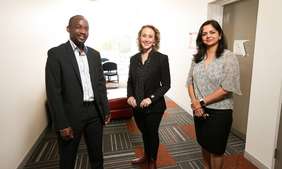 PREPARED TO LISTEN: Richard Ogetii, Minister for Prevention of Family Violence Gabrielle Williams and Priyanka Mishra share ideas during the minister's visit to Gateway Health Wodonga on Wednesday. Picture: JAMES WILTSHIRE