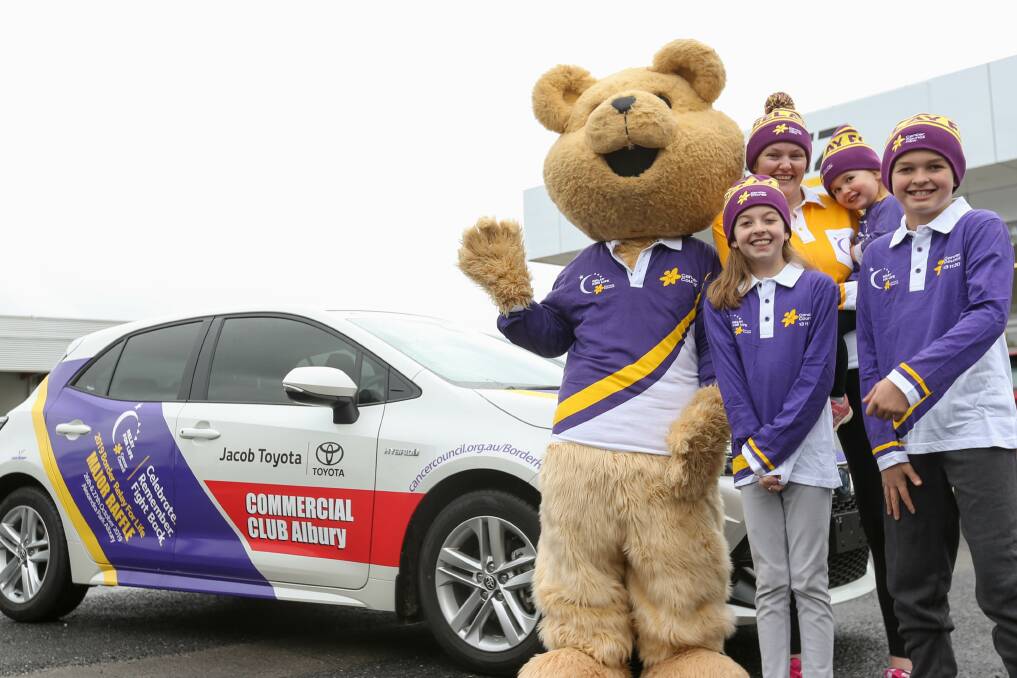 MAJOR RAFFLE: Dougal Bear, Rhiannon Grazules, Ellie Grazules, Haylee Gray and Jackson Gray with this year's Border Relay For Life raffle prize car. Picture: TARA TREWHELLA