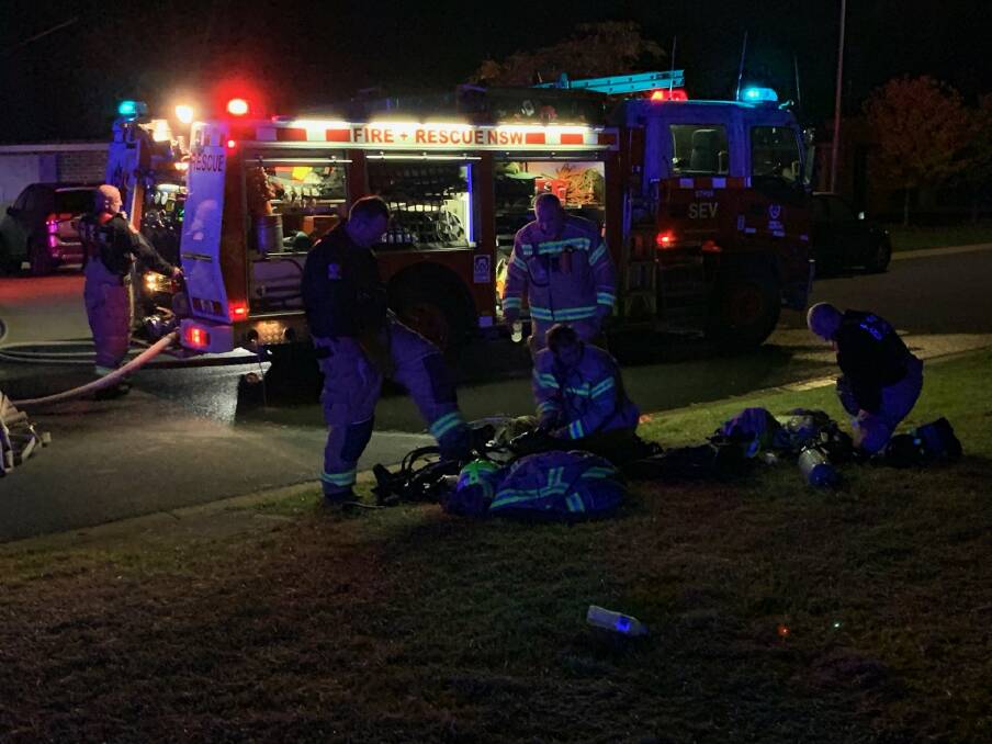 TEAM EFFORT: Three fire trucks and about 15 firefighters attended the overnight blaze. Picture: FIRE AND RESCUE NSW