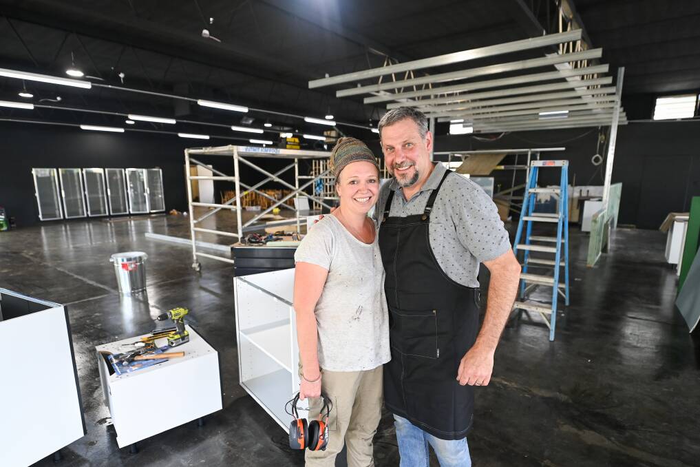 HIGH HOPES: Not willing to accept empty shops, Dee and Cameron Harmer have been running a pop-up cafe in Khancoban while fitting out a new venture that will include a grocery store. Picture: MARK JESSER