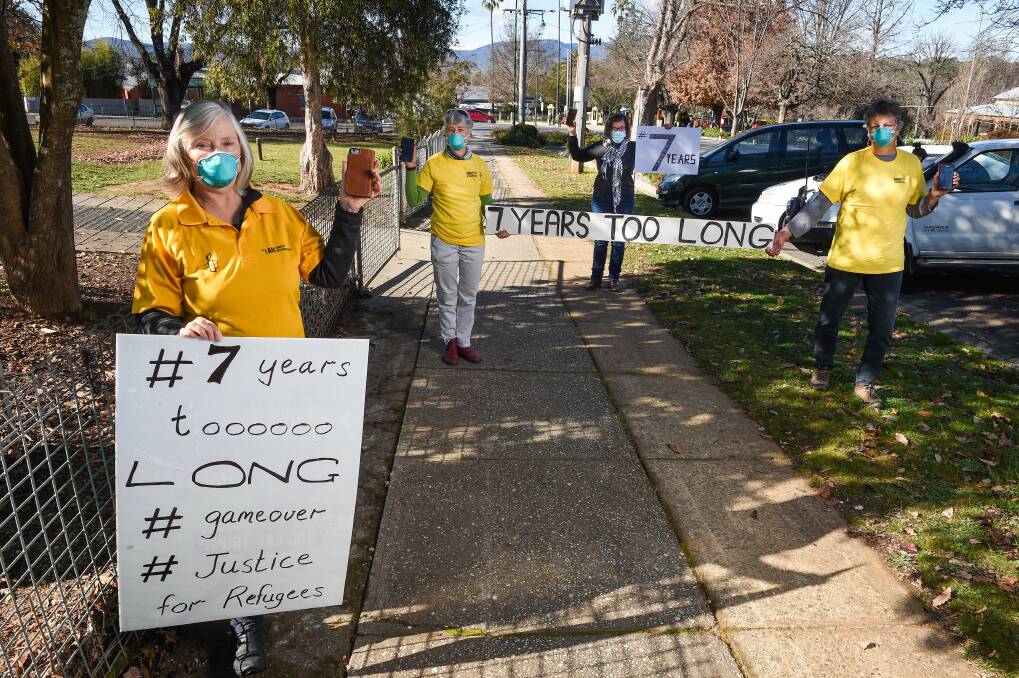 HEALTHY PROTEST: Yackandandah will host a socially distant vigil on Sunday against indefinite detention of asylum seekers, as shown by Clare Cunnington, Pauline Scott, Cathy McGowan and Kerrie Warburton. Picture: MARK JESSER