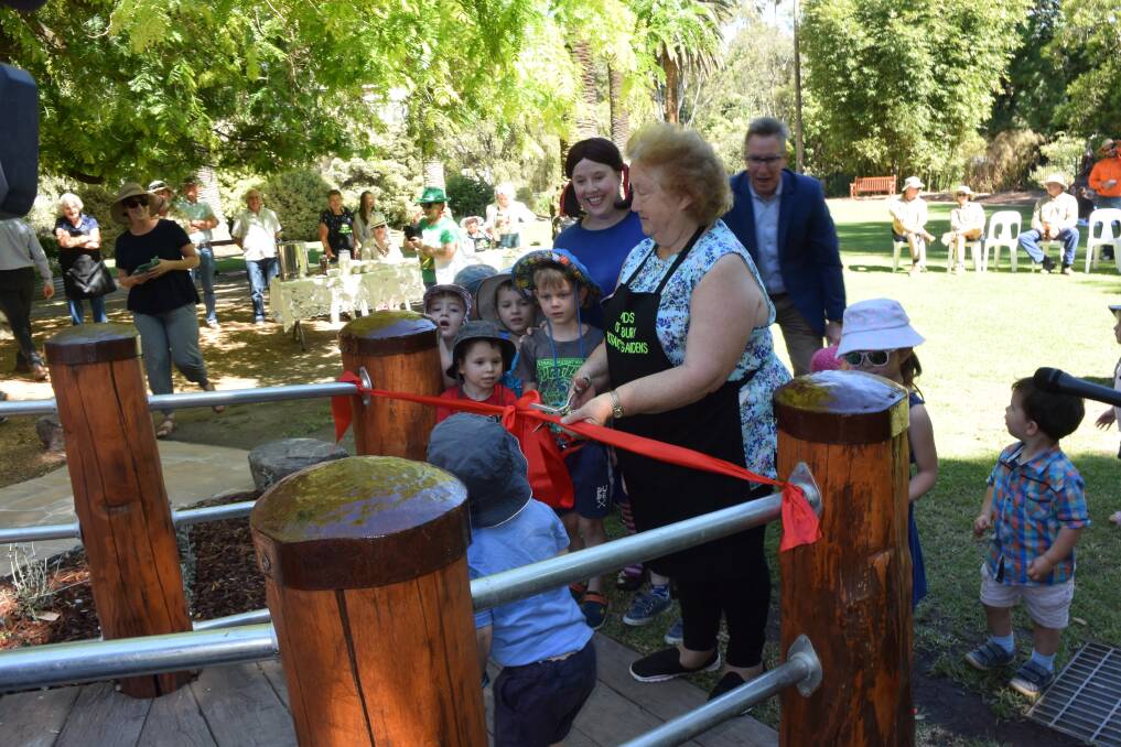 OFFICIAL OPENING: Friends of Albury Botanic Gardens founding member Gwen Klinberg cuts the ribbon.