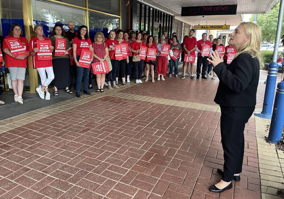 ADVOCATE: NSW Teachers Federation senior vice-president Amber Flohm talks to the Albury teachers. As they left to head to their schools she called out "it's a marathon, not a sprint, go slow, take care of yourselves". Picture: JANET HOWIE 