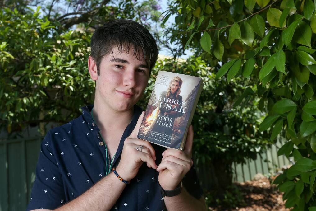 GRAB YOUR ATTENTION: Albury youth councillor Jack Jorgensen, 17, says he doesn't read "as much as he should", but will make the time to read something that interests him like The Book Thief. He feels having Death as the narrator adds character to the war novel. Pictures: TARA TREWHELLA