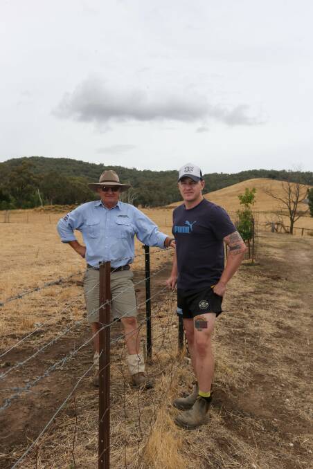TEAMWORK: Alex Wolf and his son Jamie are working together on Fencing for Fires. Picture: TARA TREWHELLA