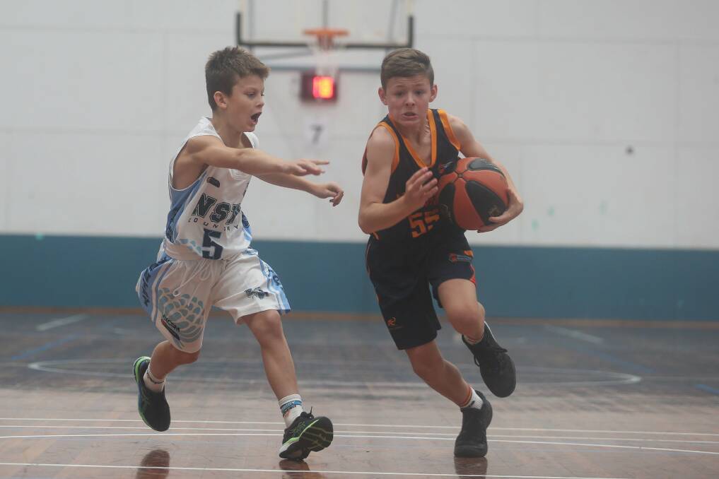 FIERCE CONTEST: Cooper Hall and Jacob Matthews are among hundreds of competitors at Lauren Jackson Sports Centre this week. Picture: TARA TREWHELLA