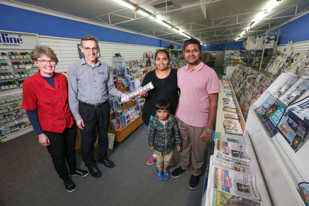 PASSING THE BATON: Jane and Barry Verbunt will hand over North Albury Newsagency to Bhavna Kerai and Arvind Bhudiya, with their son Yagnik, 4, from Monday, ending more than 26 years in the business. Picture: JAMES WILTSHIRE