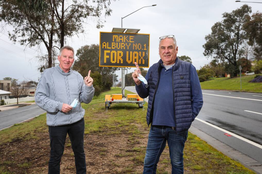 FLASHBACK: Albury mayor Kevin Mack and councillor Murray King were united in the vaccination campaign in August, but have different views about this week's revelation about a 2018 council matter involving alleged bullying.