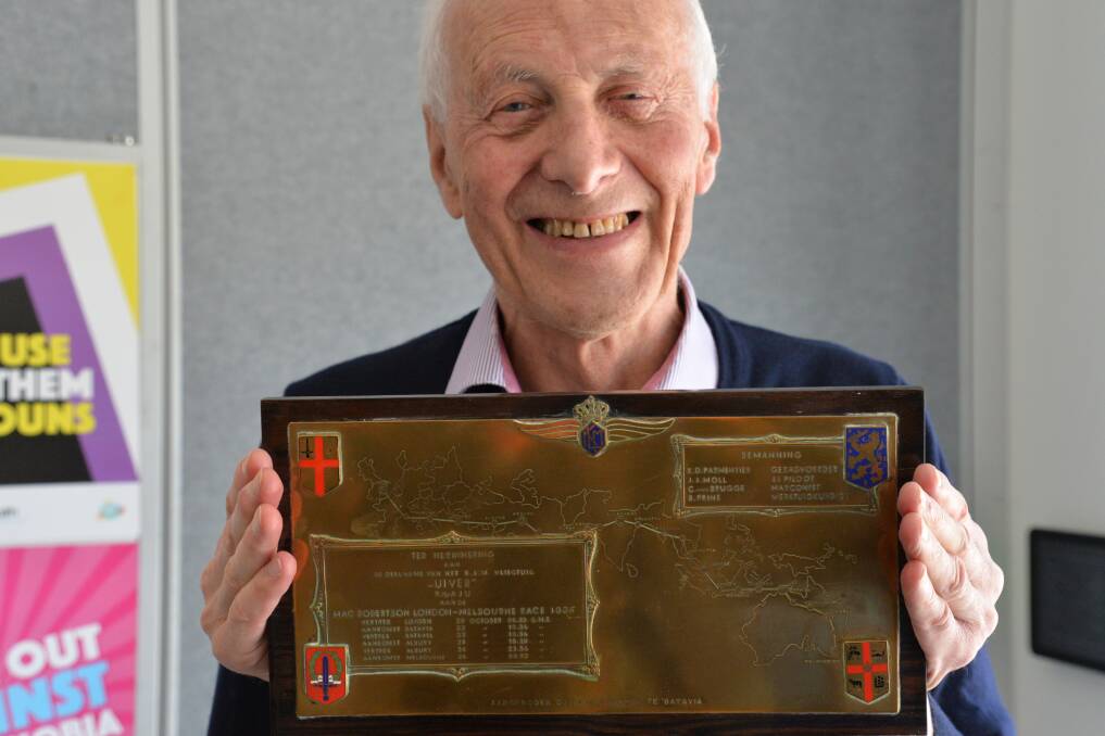 COMMEMORATIVE GIFT: Uiver historian Noel Jackling holds the 1934 memento given to each of the crew members and funded by donations from businesses in Batavia.