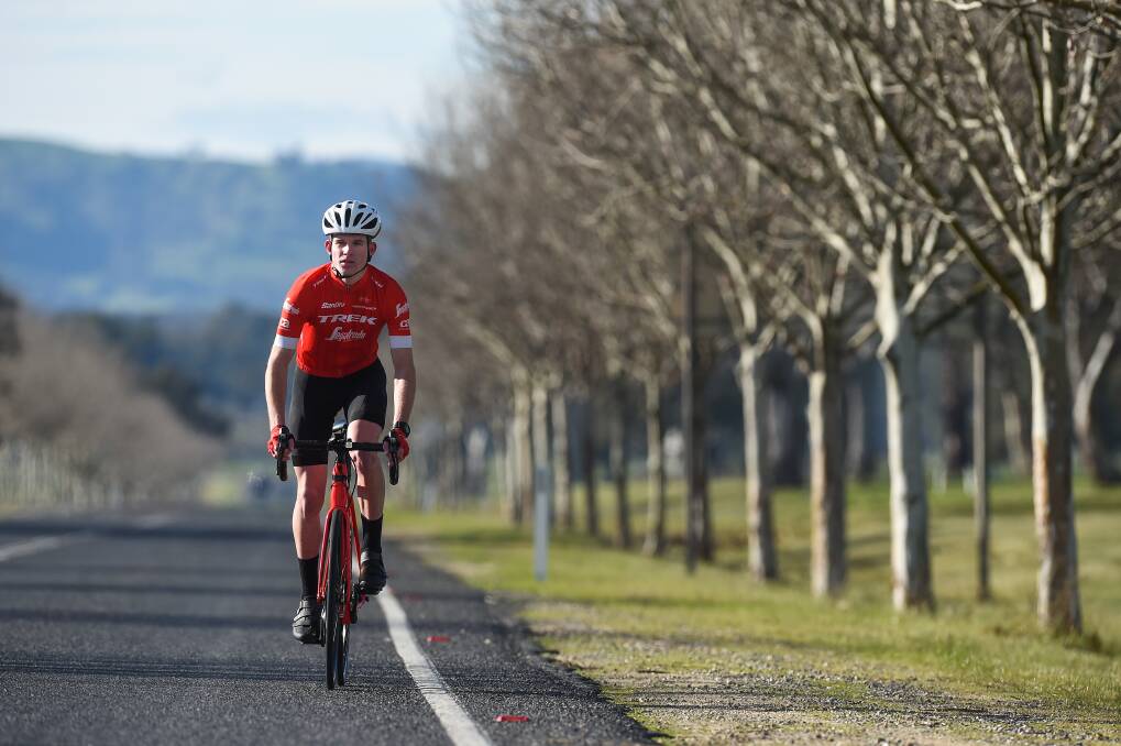 SOLID CYCLE: Supported by an escort vehicle, Wodonga's Luke Runciman will ride 160 kilometres to Wangaratta and back, through Wooragee, Beechworth, Everton Upper and Tarrawingee. Picture: MARK JESSER