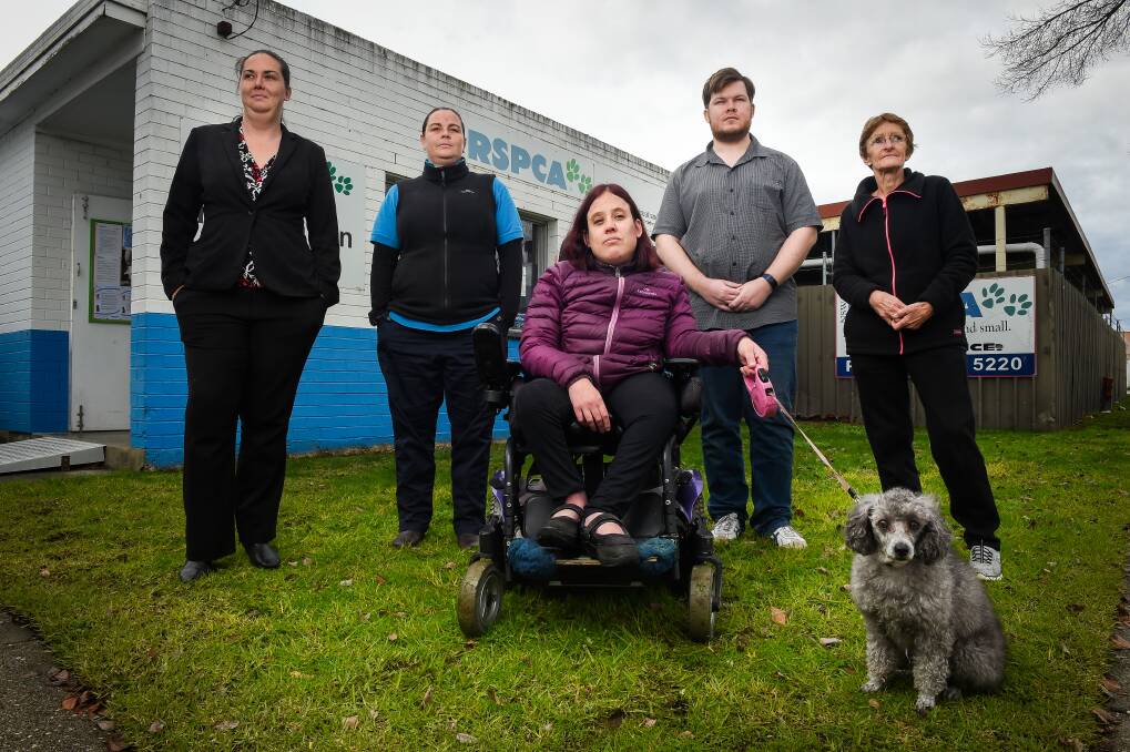 SERIOUS SITUATION: Albury RSPCA volunteers Alison Parry, Amy Norris, Kate Fiedler with her dog Gabby, Jakob de Wit and Alinda Norris say the branch faces a serious crisis. Picture: MARK JESSER