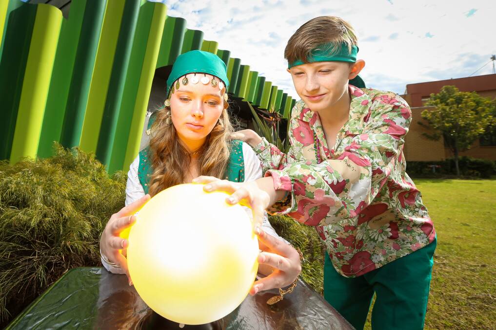 DRAMATIC EFFECT: While none of us know the future, young actors Starcia McNulty, 16, and Dexter Horne, 10, have a go at some crystal ball gazing. Picture: JAMES WILTSHIRE