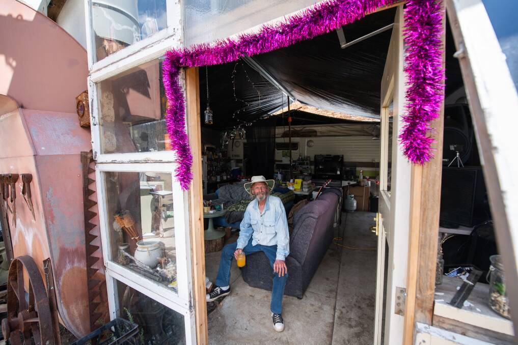 RESILIENCE: Mark Brooks, 61, is still living in a makeshift horseshoe of caravans after his Thowgla Valley home was destroyed by fire a year ago. Picture: MARK JESSER