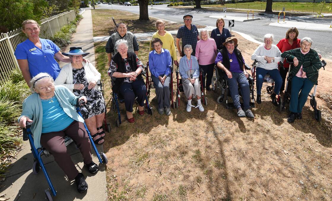 LONG-AWAITED CHANGE: Oolong Hostel residents next to the new crossing. A hostel volunteer first submitted a proposal for a pedestrian crossing to then-Corowa Council in 2012. Picture: MARK JESSER