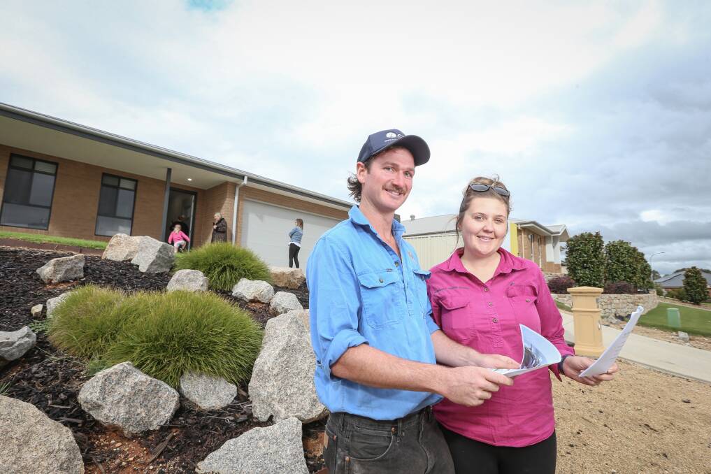 HOUSE HUNTING: Jindera couple Pat Wright and Hannah Etheridge take advantage of open home inspections once again being allowed in NSW. Picture: JAMES WILTSHIRE