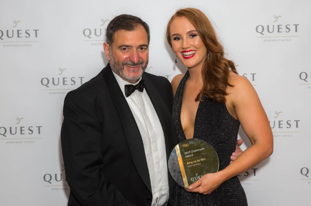 WORTHY WINNER: Quest Apartment Hotels chairman Paul Constantinou congratulates Quest Wodonga's Amy van de Ven on her Chairman’s Award for Outstanding Service.