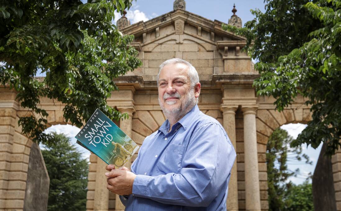 REFLECTIONS: Poet Frank Prem stands near the old hospital facade, against which he threw a muddy tennis ball as a child. "The stain's still there, so I've made my indelible mark on Beechworth," he laughs. Picture: JAMES WILTSHIRE