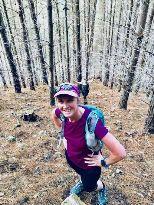 OUT AND ABOUT: Answering questions about her level of physical activity made Jo Long realise she needed to do more. Now she enjoys walking and running, here tackling Bright's Goat Track. "For me the variety of exercise options is important," she says.