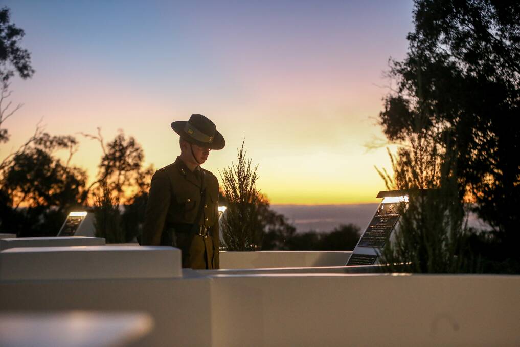 LEST WE FORGET: Anzac Day commemorations returned this year after the 2020 shutdowns. Cfn Jarrod Dezwart stands at the Albury monument during the Dawn Service. Picture: JAMES WILTSHIRE