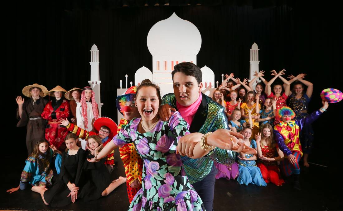 KALEIDOSCOPE OF COLOUR: The cast of Musicopia, led by Hayley Barkley, 13 (Clown 1), Annika Sorrensen, 14 (Ivanka), and Harry Partington, 15 (Frederico), rehearse on Wednesday at Catholic College Wodonga. Picture: KYLIE ESLER