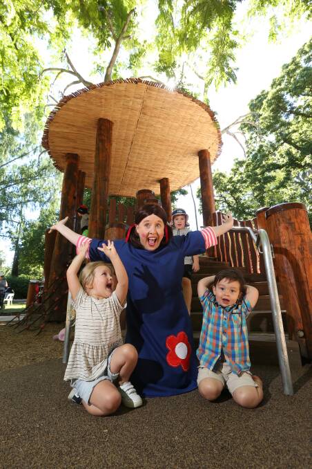 OPEN WIDE: Billie Murfitt, 3, of Wodonga, Natasha Quinn as Jemima from Play School, and Albury's Lucas Pope, 2, celebrate the opening of the tree house, watched by Jacob Stephenson, 4, of Wodonga. Picture: KYLIE ESLER