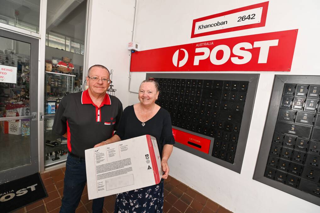 DELIVERY BOOM: Ron Aarons and Bronwyne Kremmer, of Khancoban Post Office say parcel numbers each week have quadrupled during the pandemic. Picture: MARK JESSER