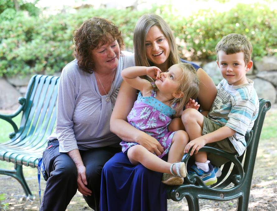 CATCHING UP: Lutheran Aged Care's Clare Dawson shares a lighter moment with Damara Ryder and her children Maeve, 2, and Kade, 5. Picture: KYLIE ESLER