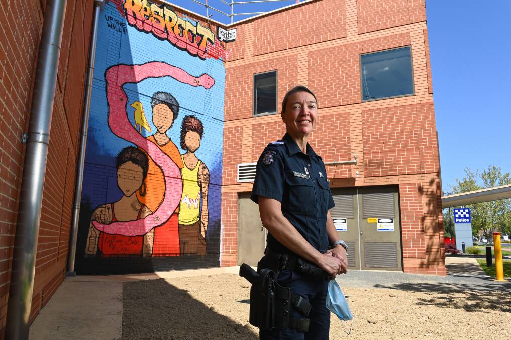 POSITIVE RELATIONSHIPS: Wodonga Acting Sergeant Raquel Vogel said the young people showed pride in their work as the art project took shape. Picture: MARK JESSER