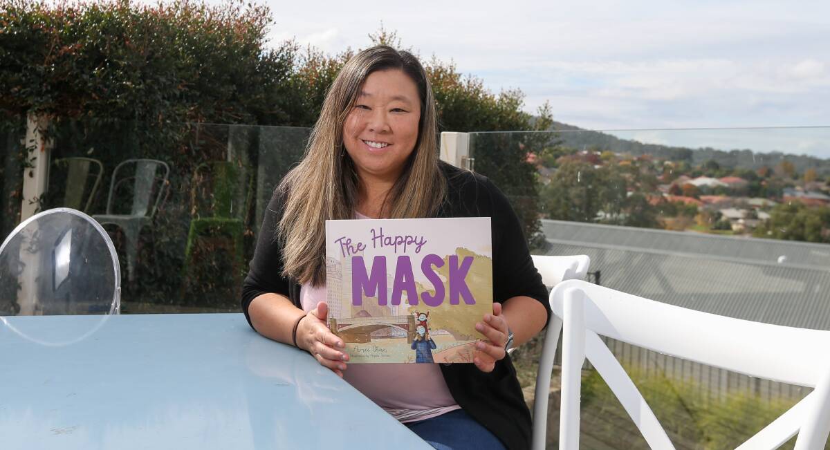 SIGN OF THE TIMES: Border author Aimee Chan says her pandemic picture book The Happy Mask touches on themes the community is still facing. Picture: TARA TREWHELLA