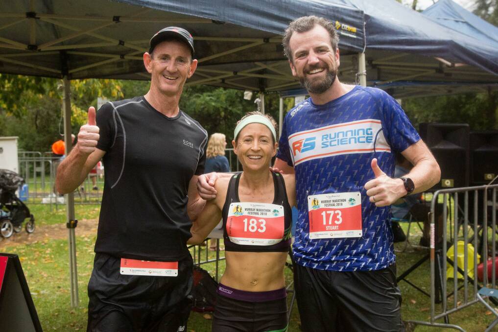 SEAL OF APPROVAL: Damien Gillard (first local), Bec Rosel (first female), of Melbourne, and Stuart Donaldson (first male), of Sydney, competed in last year's half marathon. Picture: ADAM WILSON, GREYBOX PHOTOGRAPHY