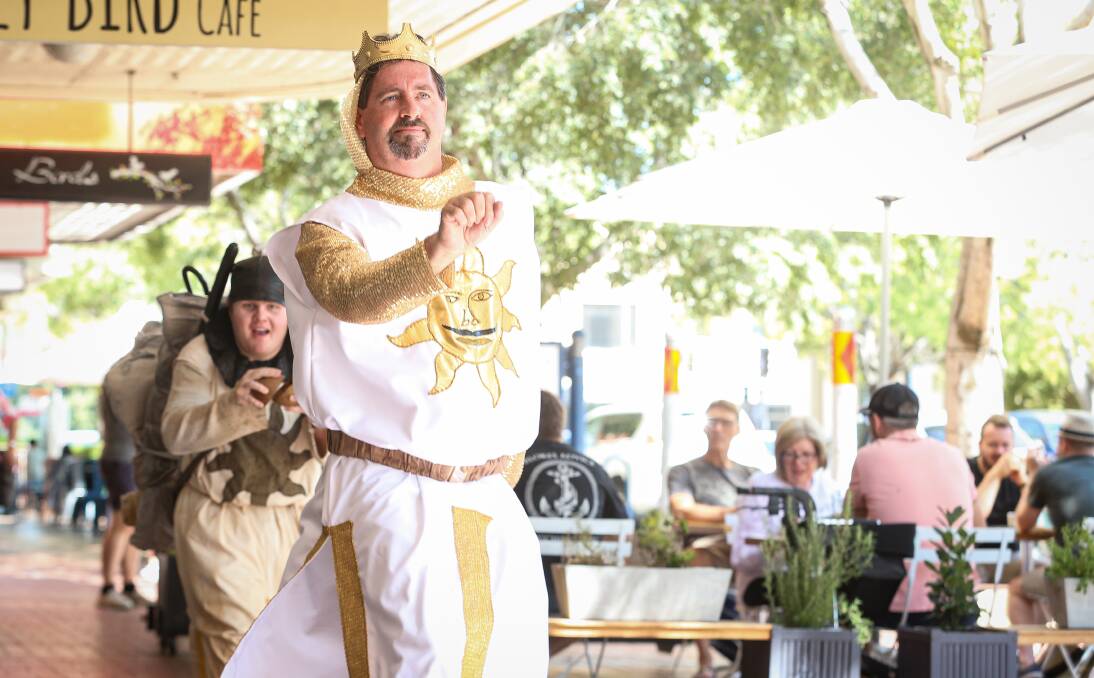 ONWARD WE GO: King Arthur (Barry McIntosh) and Patsy (Mitch Clarke), from the Border production of Monty Python's Spamalot, March 11-14, canter down Dean Street to the bemusement of onlookers. Picture: JAMES WILTSHIRE