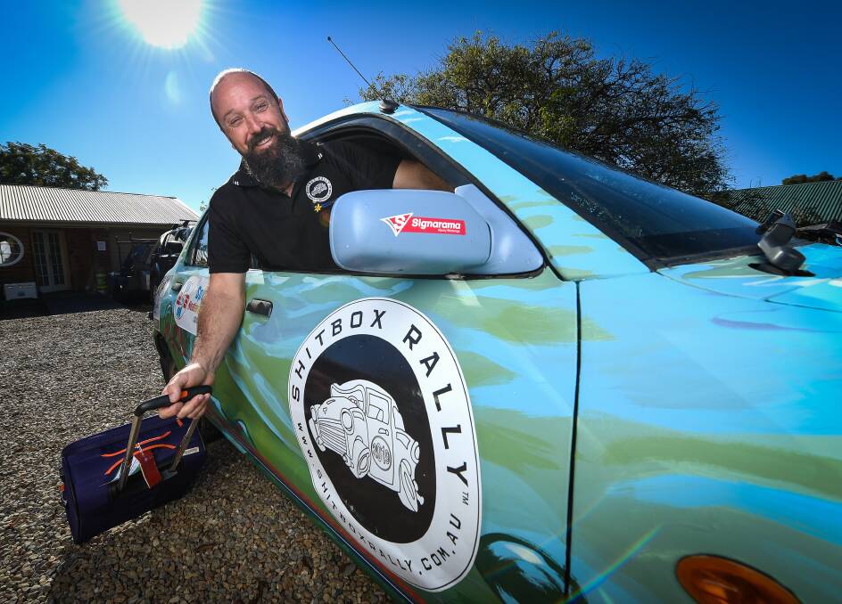 HITTING THE ROAD: Albury's Brook Ratcliff will tackle 4000km in Bubble Trouble, bought for $300 and painted by Border artist Tracie MacVean. Picture: MARK JESSER