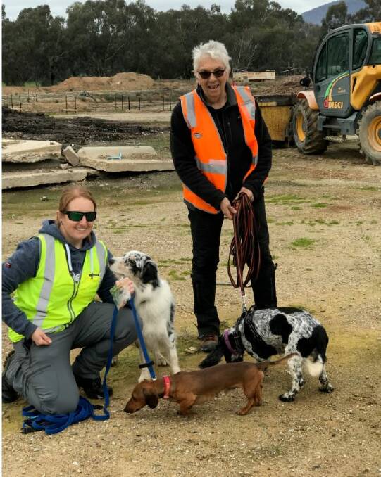 RESCUE PARTY: Snag is finally safe, thanks to the efforts of Giselle Henning and Marg Thomas and their dogs rebel and Lucy.