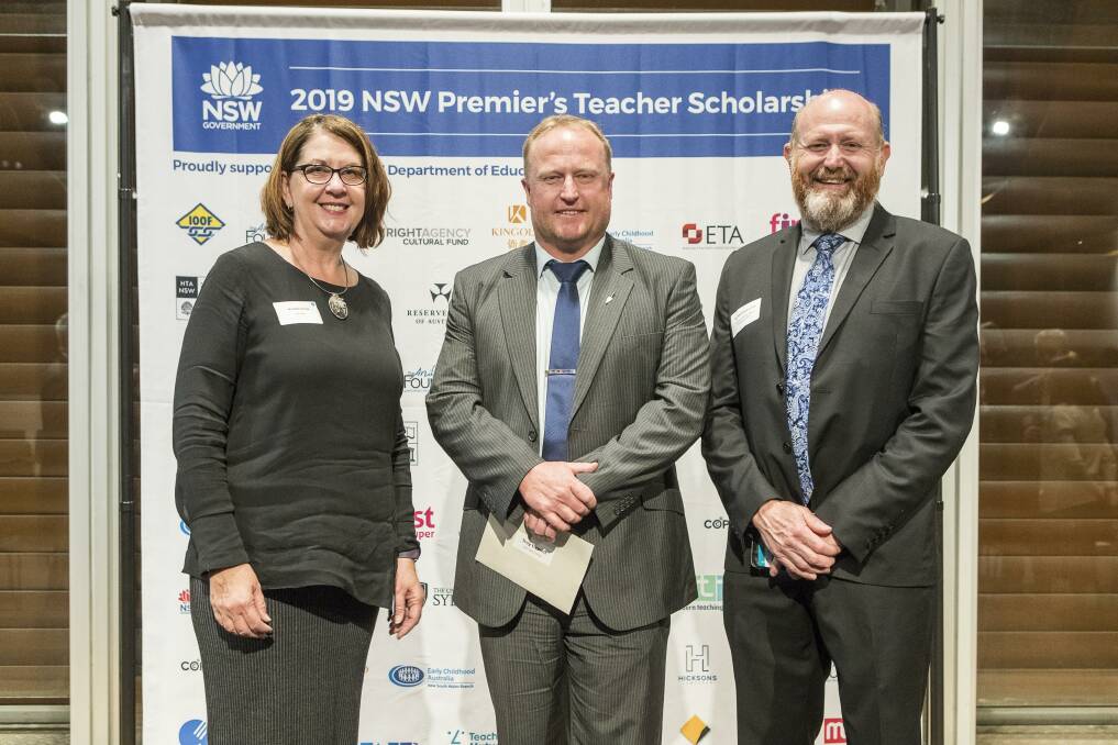 RESEARCH REWARD: TAFE NSW regional general manager Kerry Penton with scholarship recipient and head teacher of bricklaying at TAFE NSW Albury Troy Everett and TAFE NSW head of infrastructure, energy and construction Chris Outten at the Premier’s Teacher Scholarship award presentation at The Mint in Sydney.